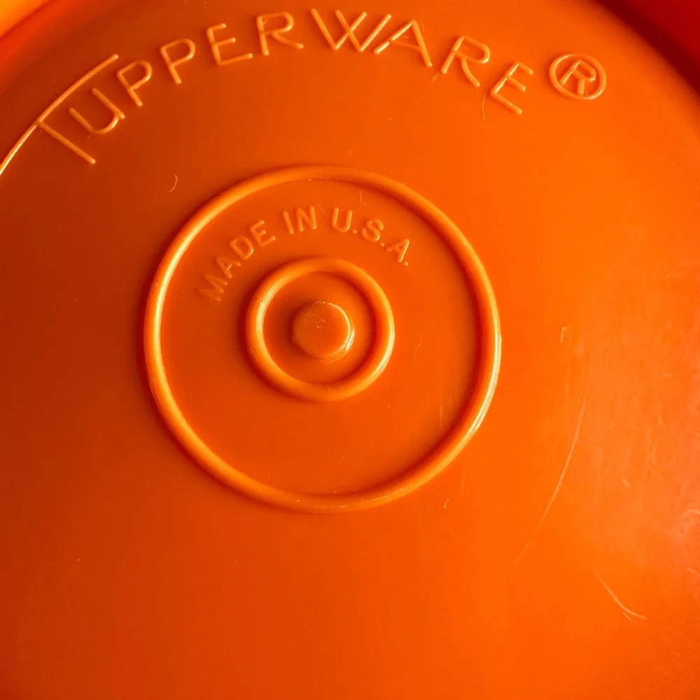 Vintage Tupperware servalier bowl orange with lid holds 2 cups